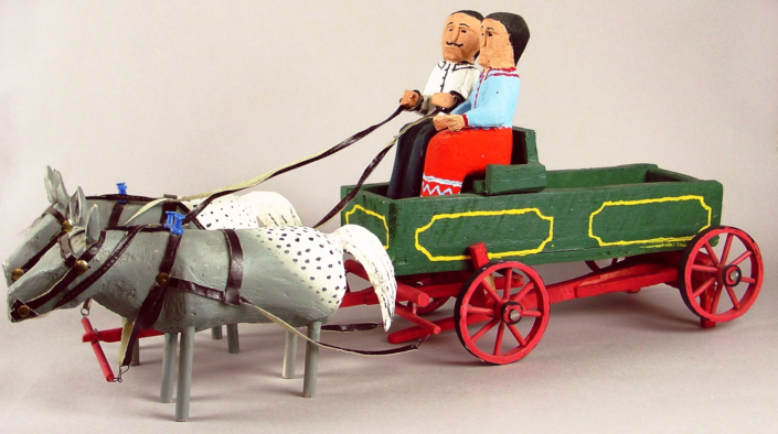 20006952 Woody Herbert, Navajo Couple, Horses and Wagon, 20th century wood, paint, 12 x 8 x 25.5 in. Collection of the Tucson Museum of Art. Gift of Peter P. Cecere. 2000.69.52